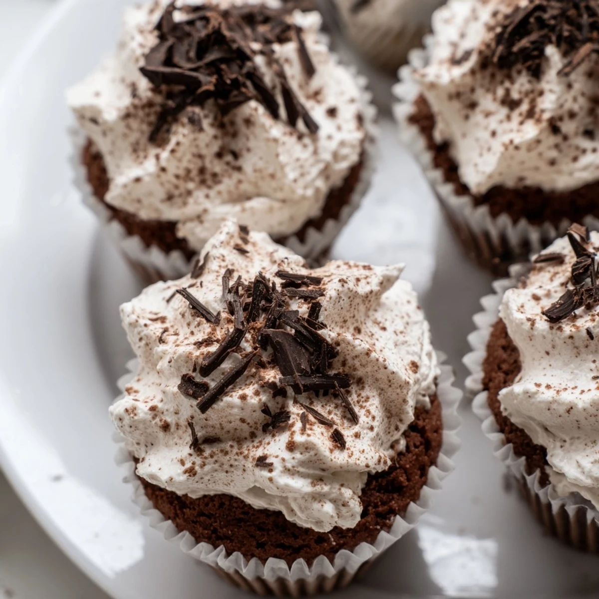 Rich chocolate cupcakes soaked in coffee syrup and crowned with creamy mascarpone frosting