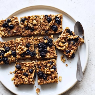 Warm baked oatmeal casserole with walnuts and cinnamon baked until perfectly set and golden